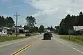 Looking east at the sign for Monico