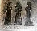 Brass of a man and his two wives