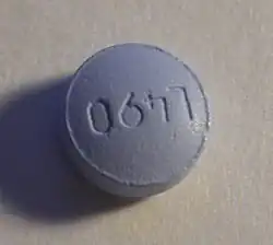 220&nbsp;mg tablet of naproxen sodium. Imprint L490 (upside-down). Round, light blue tablet[16]