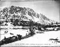 Packtrains carrying freight along One Mile River, 1898