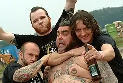 Peter Pan Speedrock at Graspop 2005 with mascotte Dikke Dennis Picture: Rudy de Doncker[usurped]