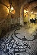 Detail of the entrance's floor mosaic.