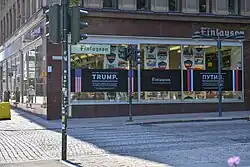 Trump and Putin's welcoming posters were visible in the street scene