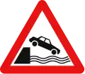 Quayside or riverbank ahead