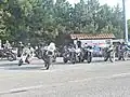 Motorcycles parked alongside the 'chalet' bar.