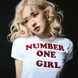 Rosé wearing a white t-shirt with the song title printed on it