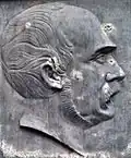 Relief John Brinckman Brunnen in Rostock