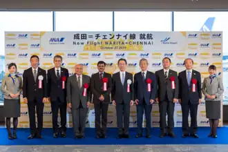 Ryuko Hira with Ambassador of India to Japan, Sanjay Kumar Verma, and other dignitaries during the Narita-Chennai flight inauguration in October 2019