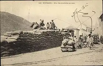 Packing into sacks