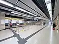 Unpaid area of the concourse, with the customer service centre (April 2022)
