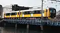 "Brilliant Orange Yellow" liveried set A3004 in November 2018