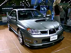 Small front splitter below the bumper of Subaru Impreza WRX.