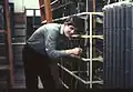 An engineer works on the TXE1 MDF
