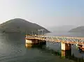 Reservoir and sluice gate bridge