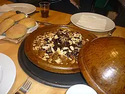 Moroccan-style tagine of lamb with prunes and almonds