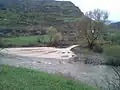 The Shnogh River, muddied by the mine, meets the Debed