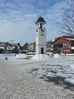 Telšiai clock-tower with a bear, the symbol of Samogitia