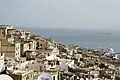 Terraces descending "in steps" towards the sea.