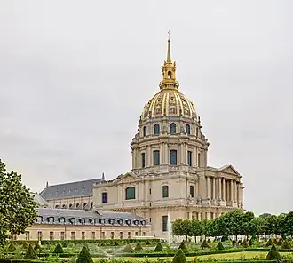 The cathedral is to the left, behind the dome church