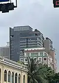 The MarQ Apartment and LIM Tower 3 (grey, left)