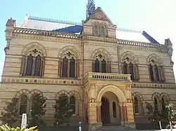 This is a photograph of the Mitchell Building built in 1882, the oldest building on campus.