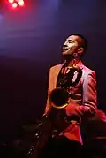 Atsushi Yanaka on baritone saxophone (Original Member)