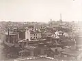 Looking north east. On the left hand edge one can see the Church of the Holy Trinity and in the centre can be seen the spire of the Toronto Normal School. Further to the right are group of churches, one which is Knox Presbyterian (photo)
