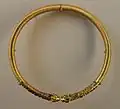 Achaemenid torc from Persia, c. 350&nbsp;BC, Susa, with ribbed hoop, animal head terminals, and stone inlays, from the Acropole Tomb