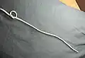 3. Complete the overhand knot.