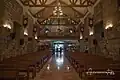 Main door and choir loft, looking down the nave