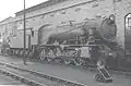 WD 2-10-0 WD 601 "Kitchener" at Carlisle Kingmoor BR shed in 1958. Note air pumps, headlight and nameplate