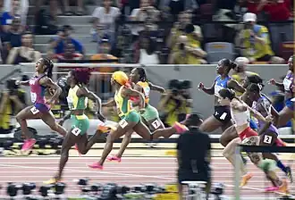Nine runners finish a 100&nbsp;m race