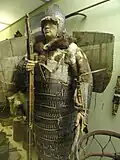 Warrior armor and sinew bow, 19th century