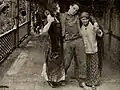 Still from the Exhibitors Herald showing a scene with William Russell and Olga Grey