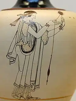 Woman spinning. Detail from an Ancient Greek Attic white-ground oinochoe, c. 490&nbsp;BC, from Locri, Italy. British Museum, London.