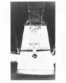 A Sparrowhawk connecting to the trapeze viewed from the Macon's hangar in 1934